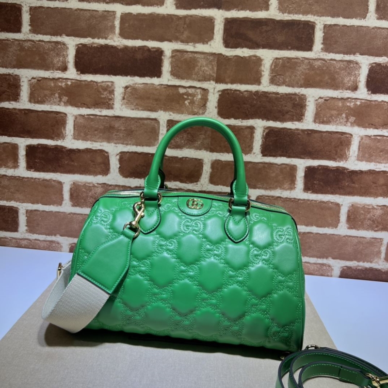 G*u*i top handle bags
